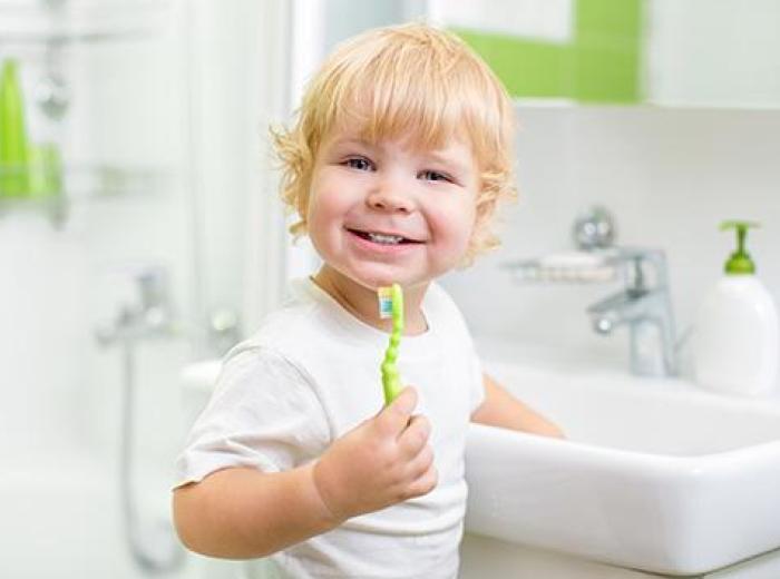 What kind of toothbrush and toothpaste should my child use?